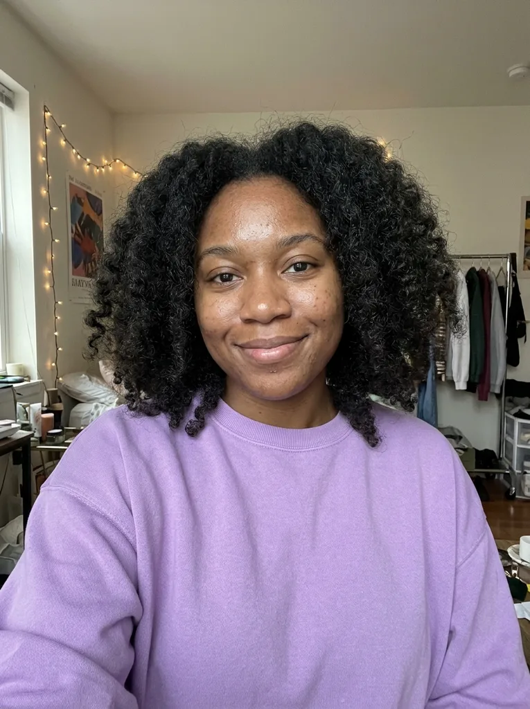 Original photo: Woman in her mid 20s with curly hair: Business Casual + Modern Office